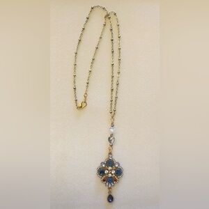 Crystal pendant gold tone necklace